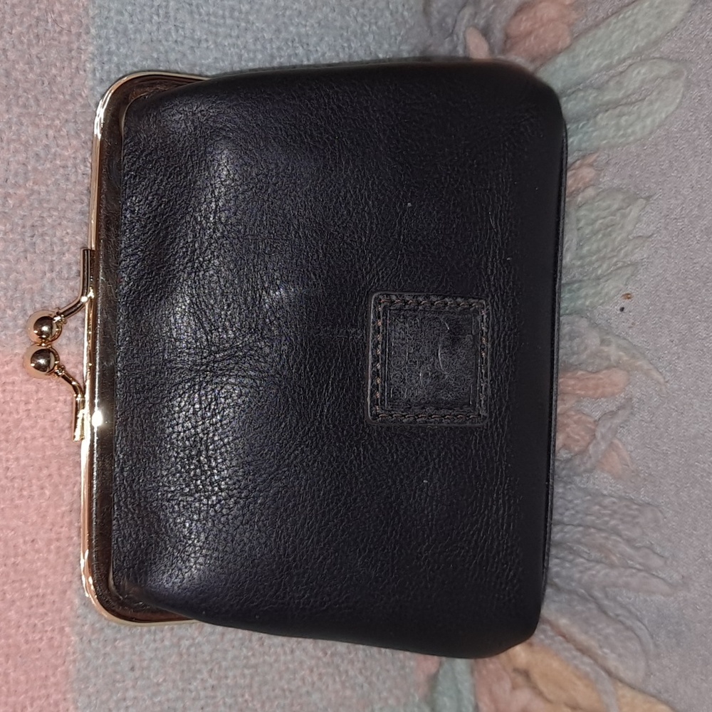 Dooney and Bourke Large framed kiss lock in black Florentine leather